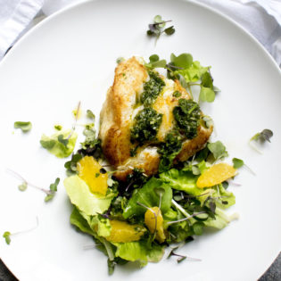 Pan Seared Cod with Citrus Chimichurri served with Orange Microgreen Salad